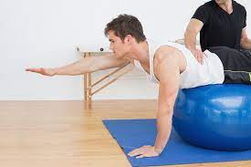 Photo of clinician treating low back pain
